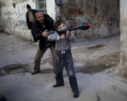 Мятежники из Сирии вербуют для участия в военных действиях детей Мятежники из Сирии вербуют для участия в военных действиях детей